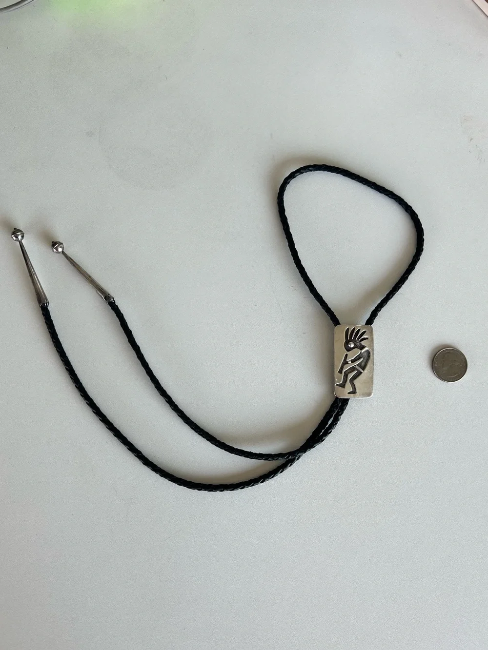 Navajo Sterling Silver Kokapeli Black Leather Bolo Tie